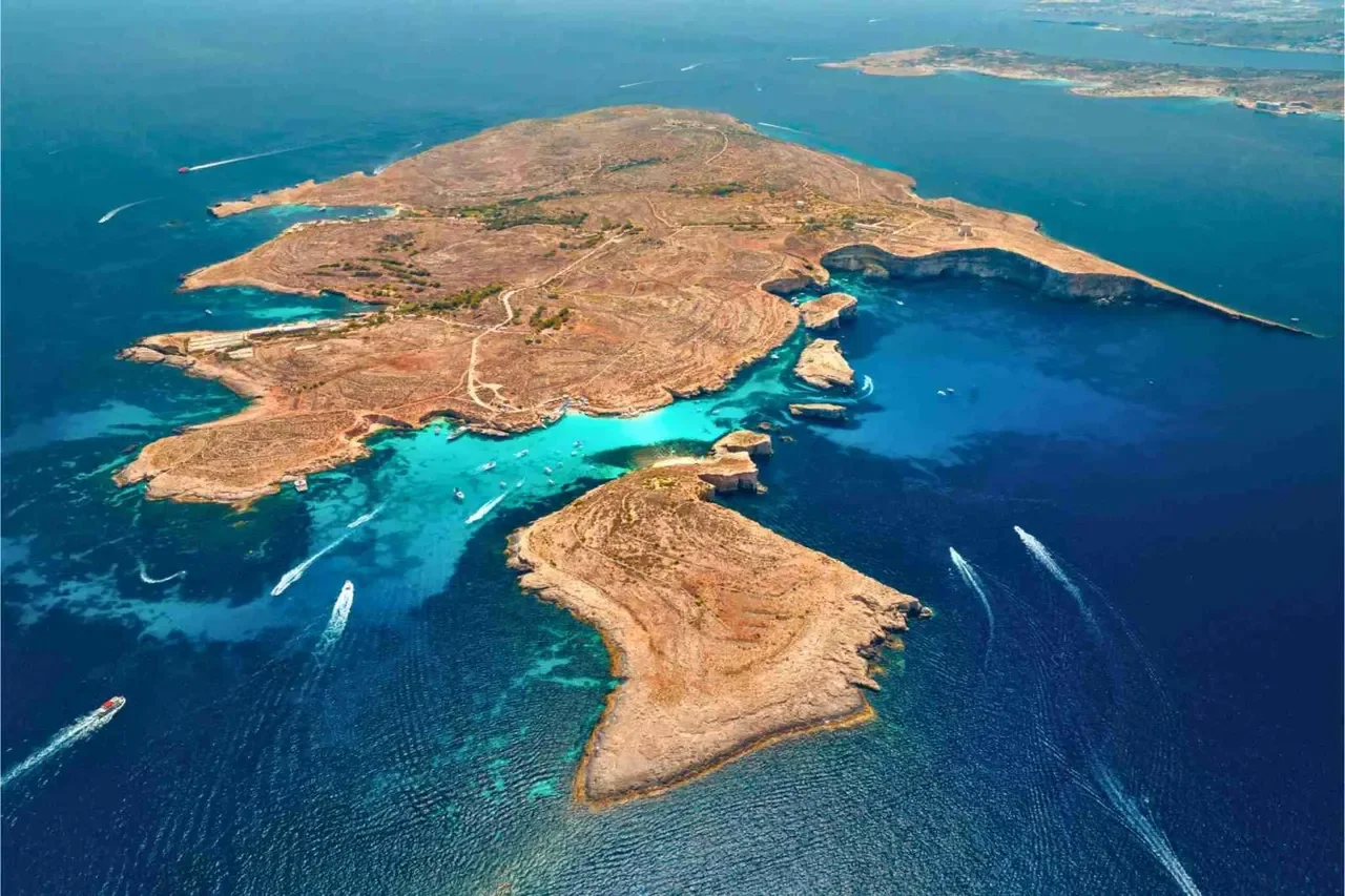 Aerial view of Comino and the Blue Lagoon’s turquoise water